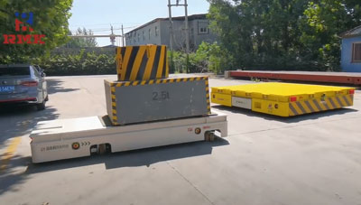 Sunkioji medžiaga be trakless perdavimo vežimėlio